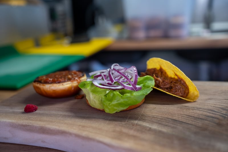 Open burger with red onion